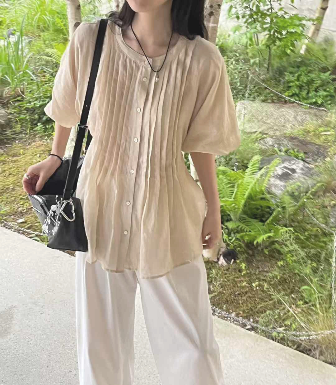 B11.初夏澎袖壓褶上衣
