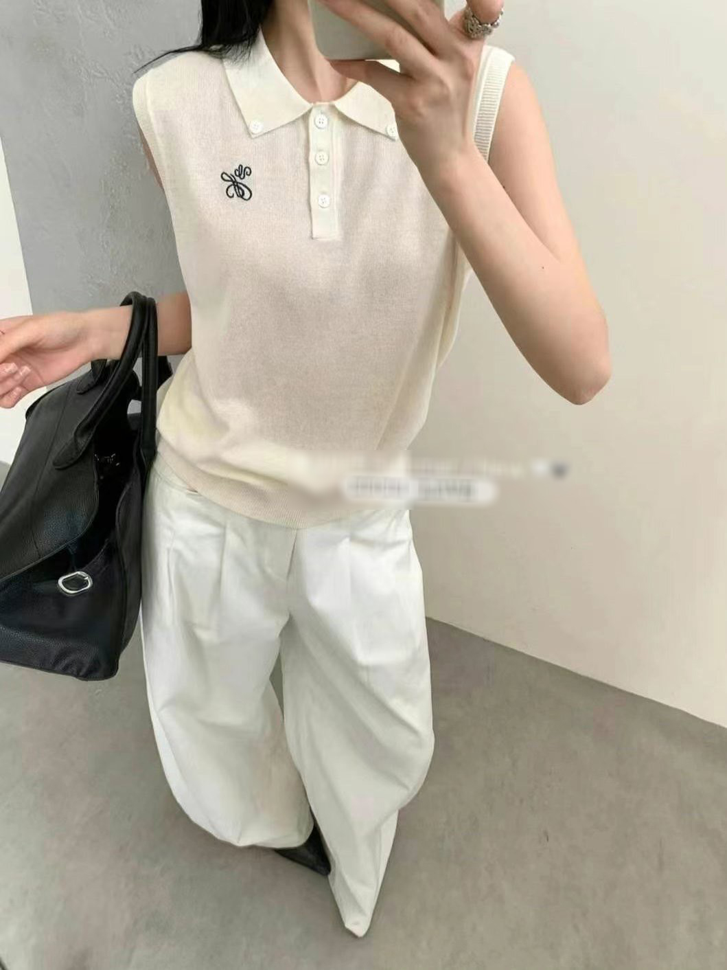 A20.可可家翻領排扣寬肩背心