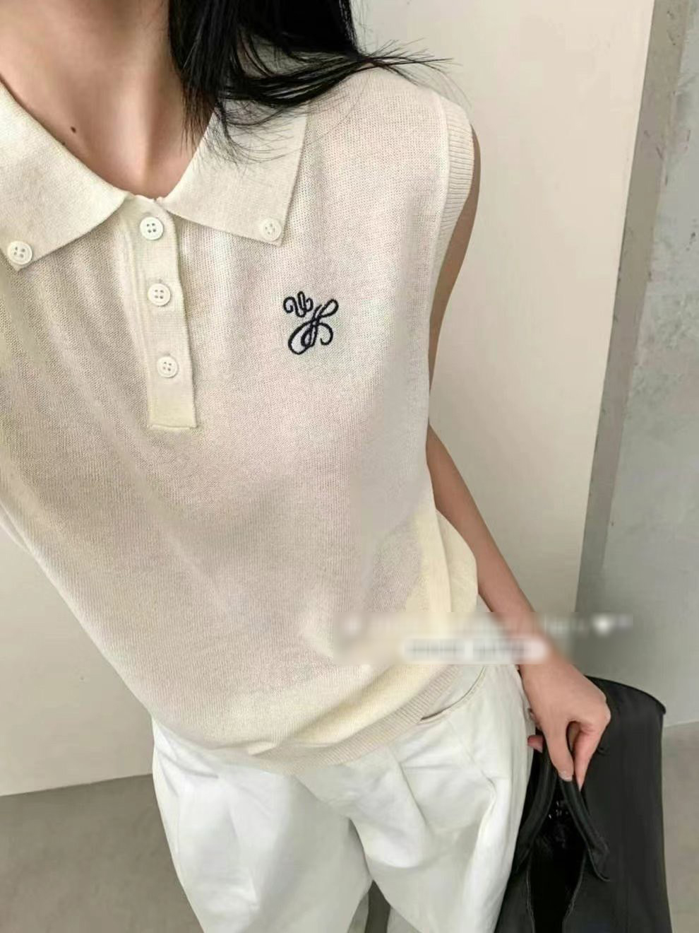A20.可可家翻領排扣寬肩背心