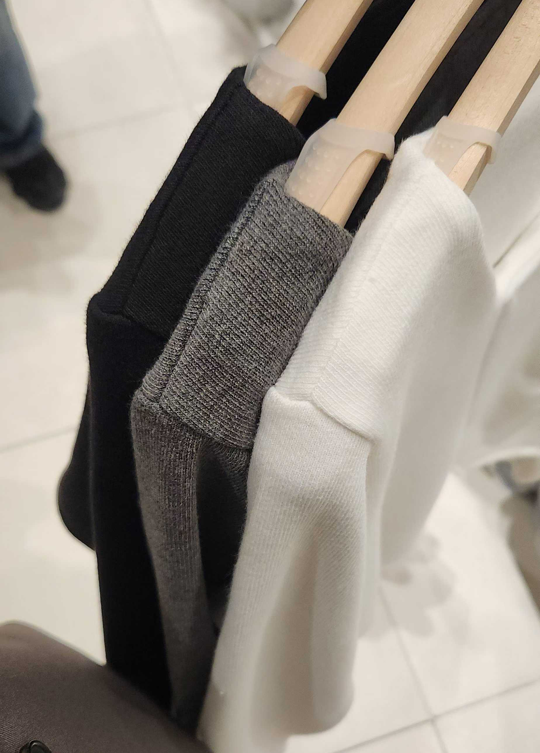 小臉歐膩造型不對稱領口針織上衣