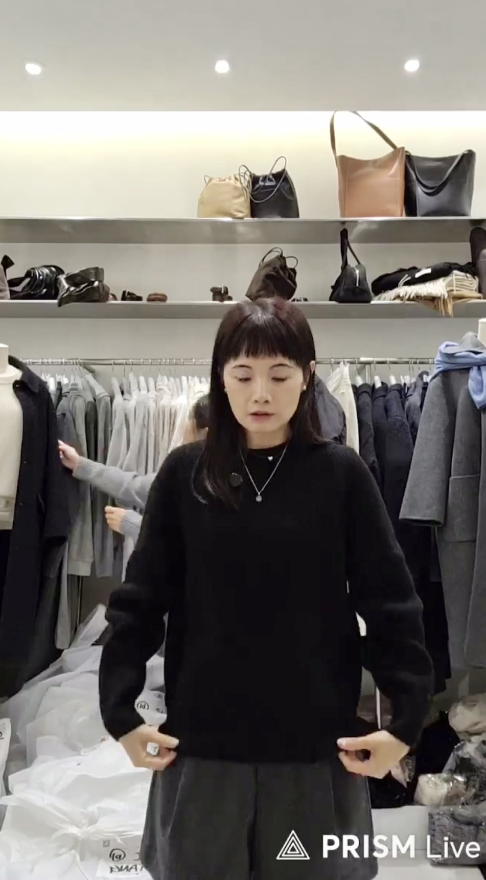 B99.質感家溫暖圓領坑條毛衣