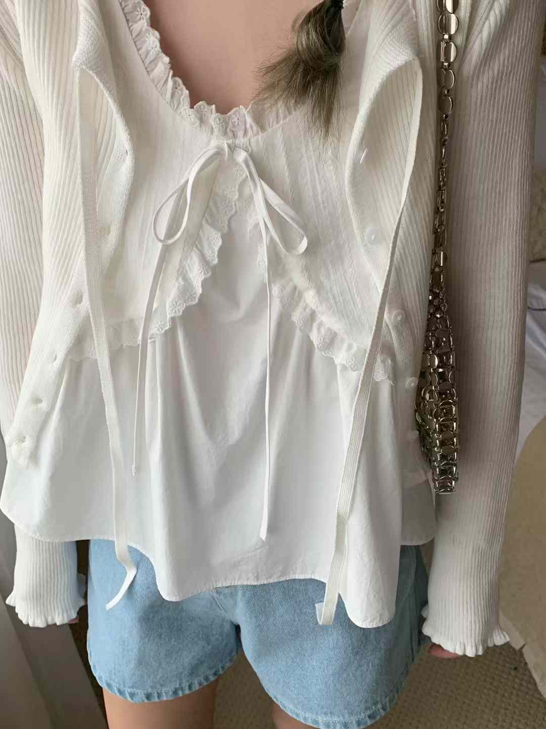 A10.荷葉領造型綁帶背心