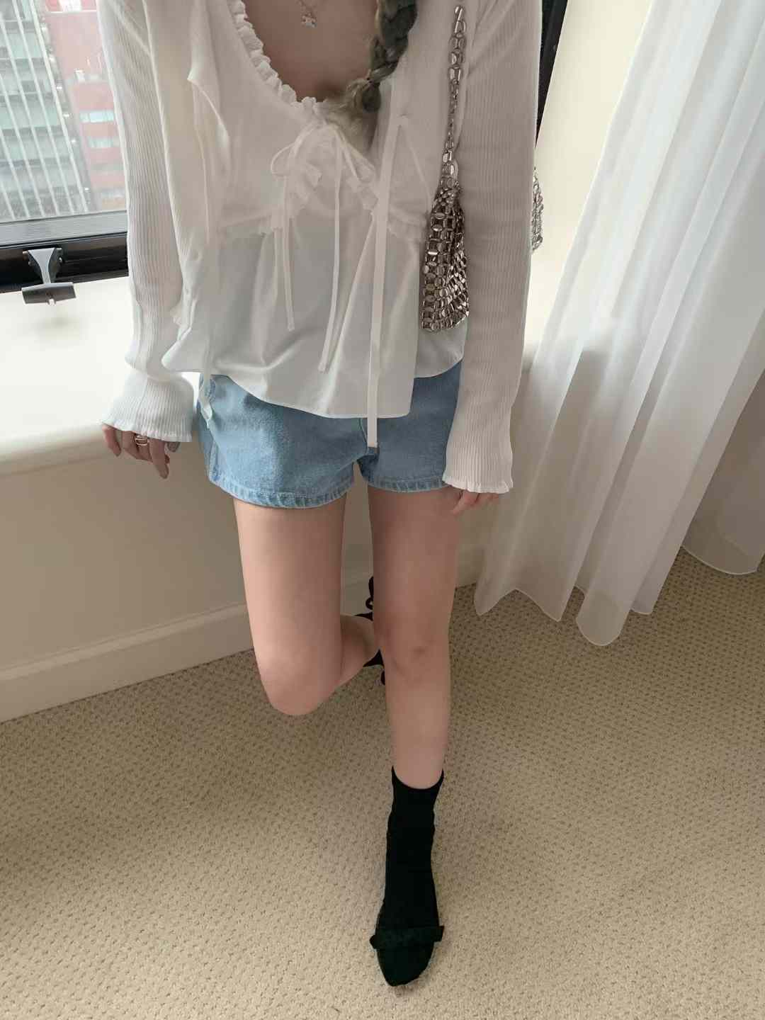 A10.荷葉領造型綁帶背心