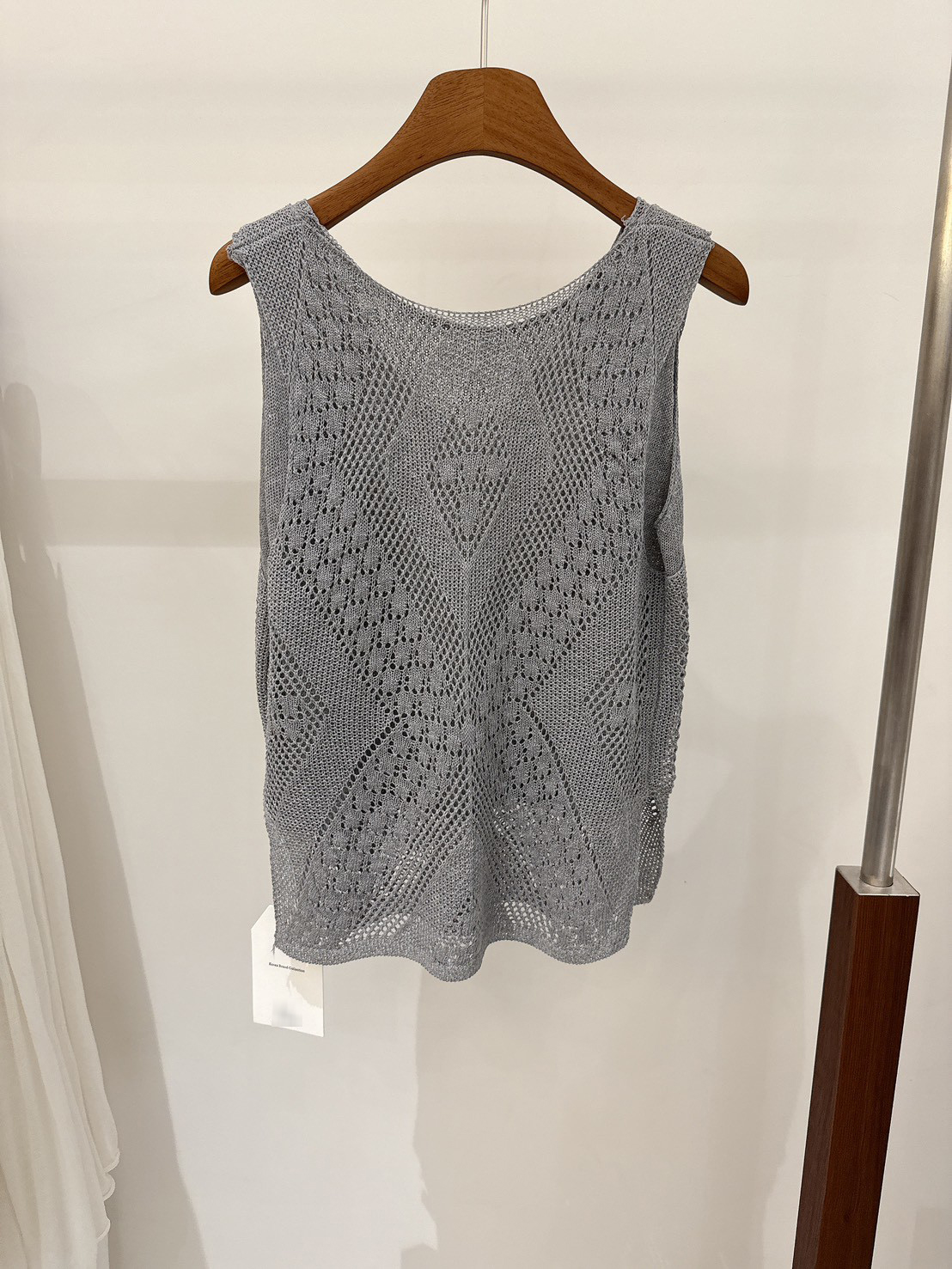 A11.漂亮菱格勾花針織背心