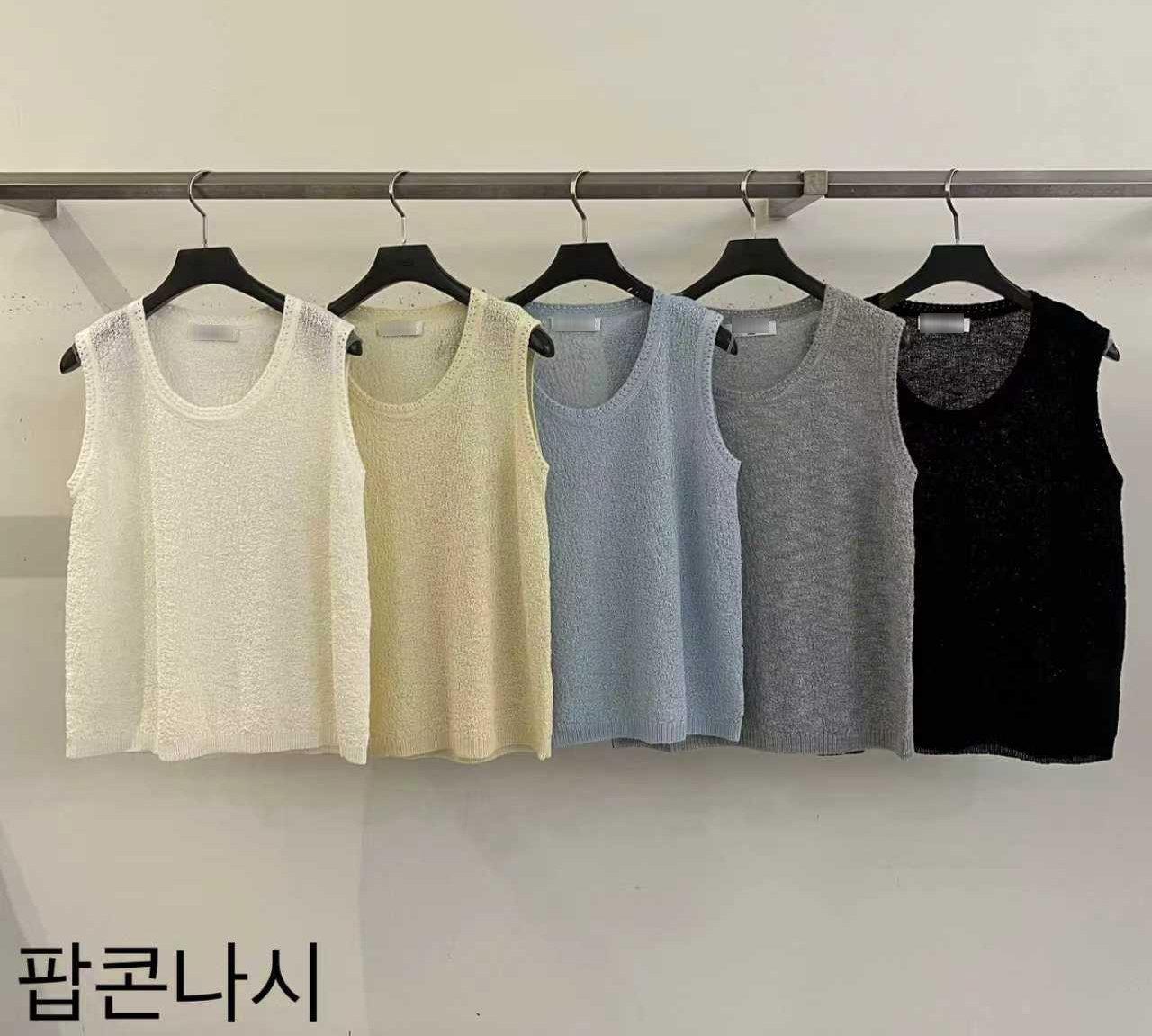 B76.小花邊奶霜針織背心