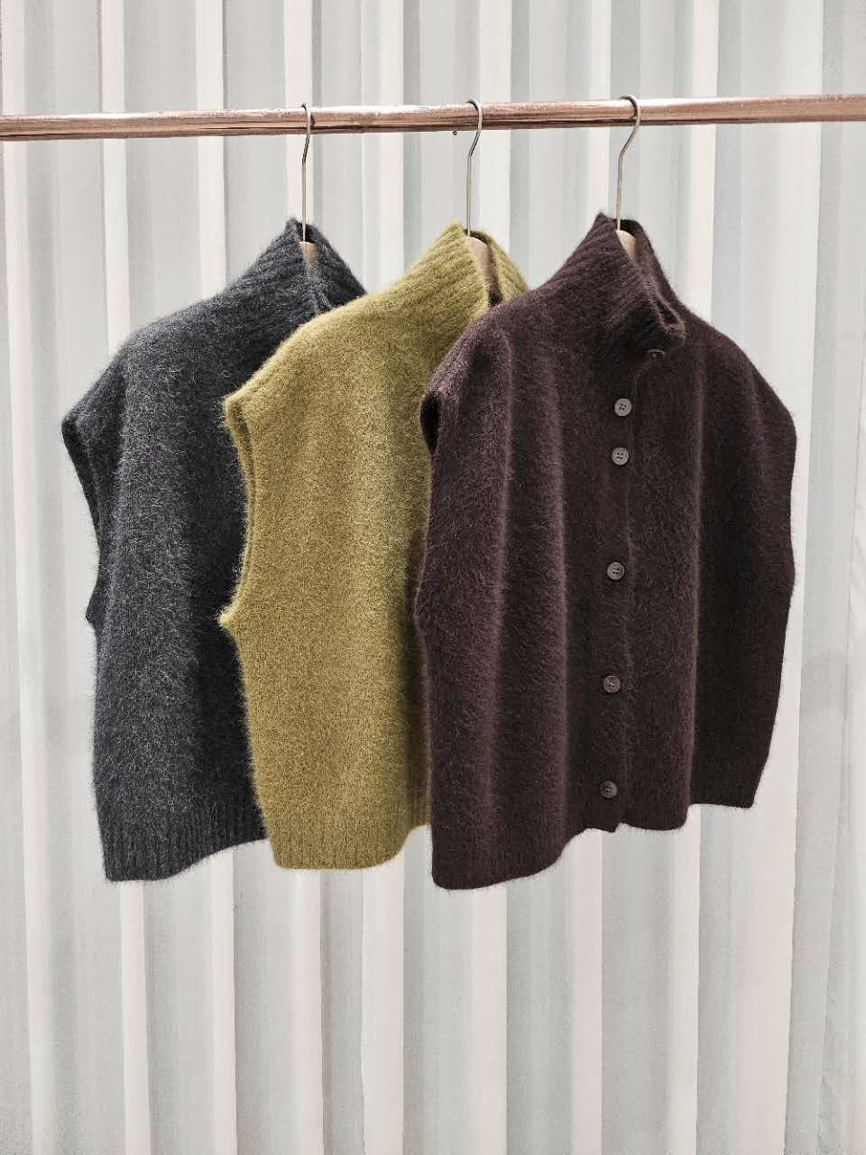 星星家浣熊羊毛高領背心外套