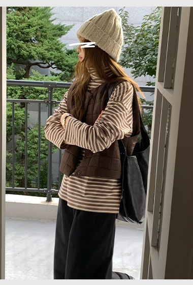 A72.輕巧女孩格子鬆餅背心