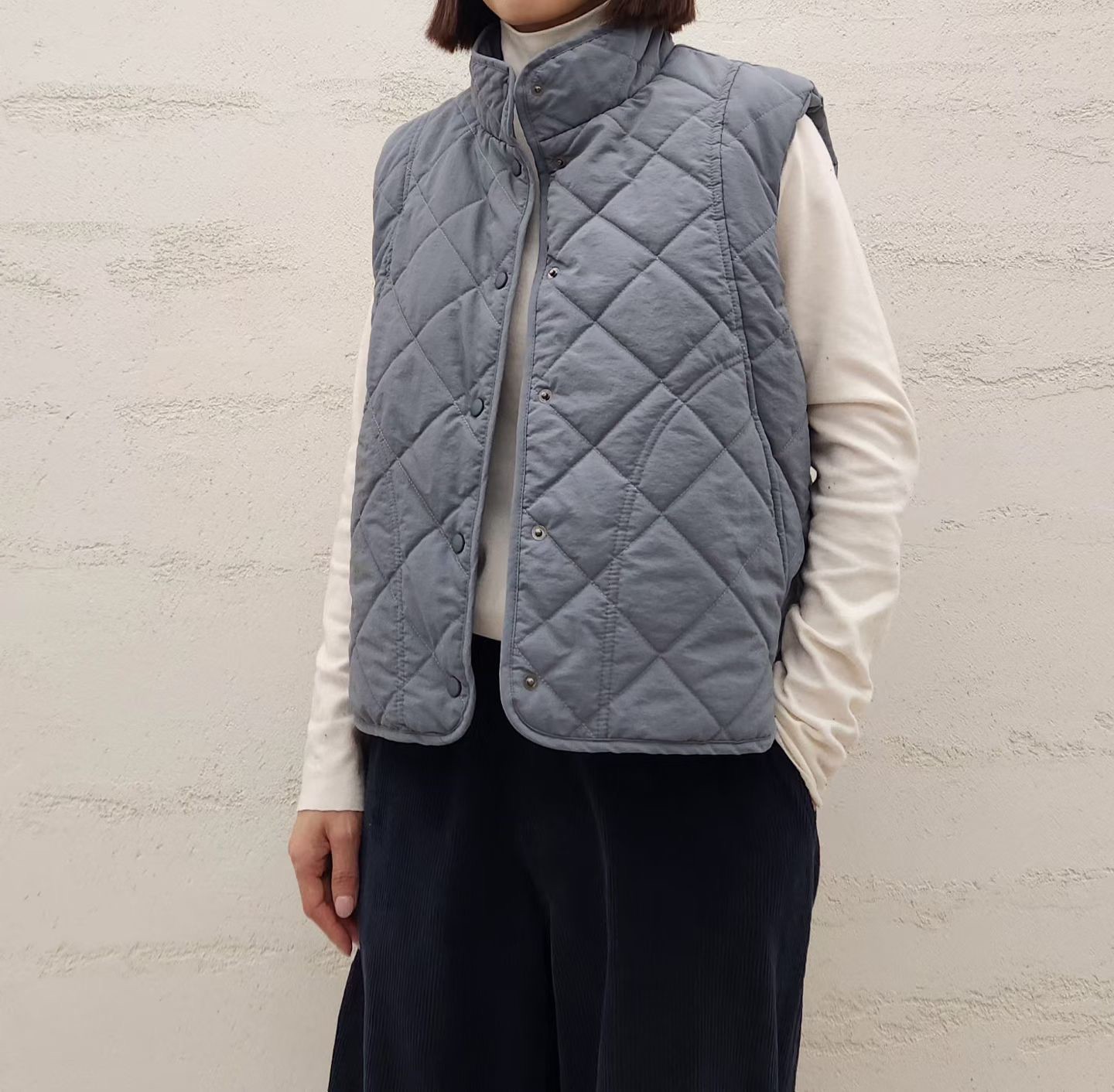 B38.帽可調家內毛毛菱格紋背心