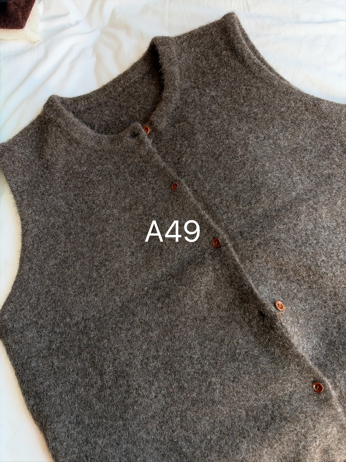 A49.巧克力46%犛牛毛衣背心