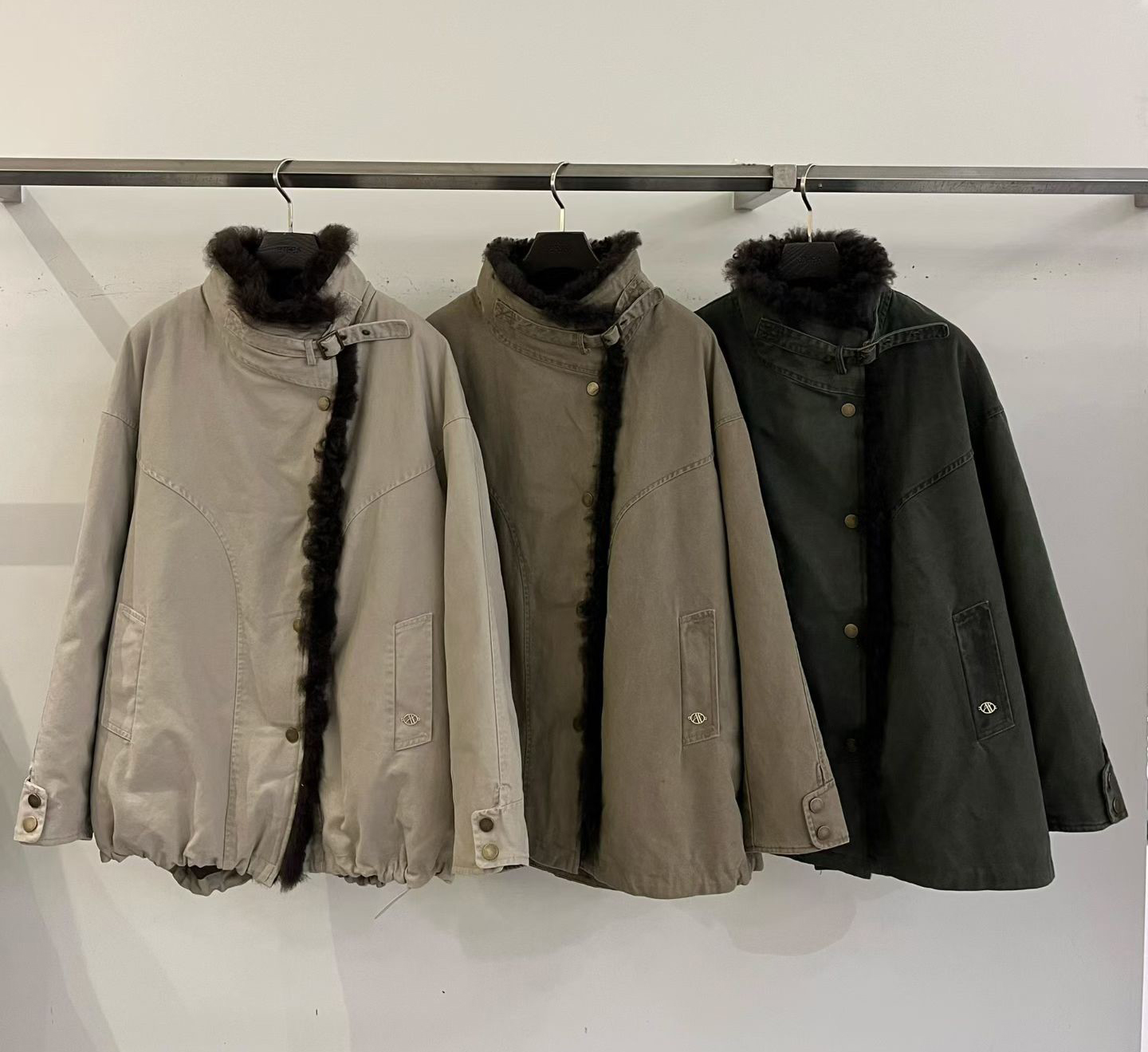 B57.玩雪卷卷羊毛率性鵝絨外套