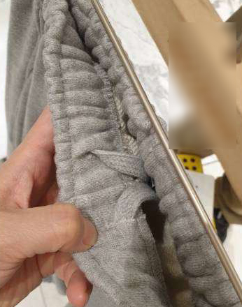 小臉歐膩側剪接線褲口抽繩棉褲