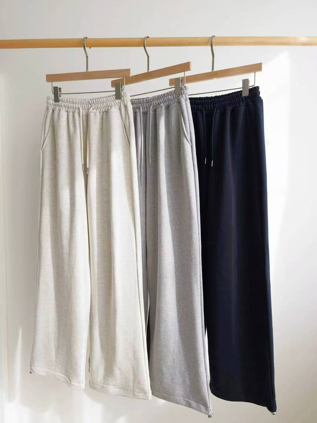 A08.兩穿下擺可縮口休閒長褲