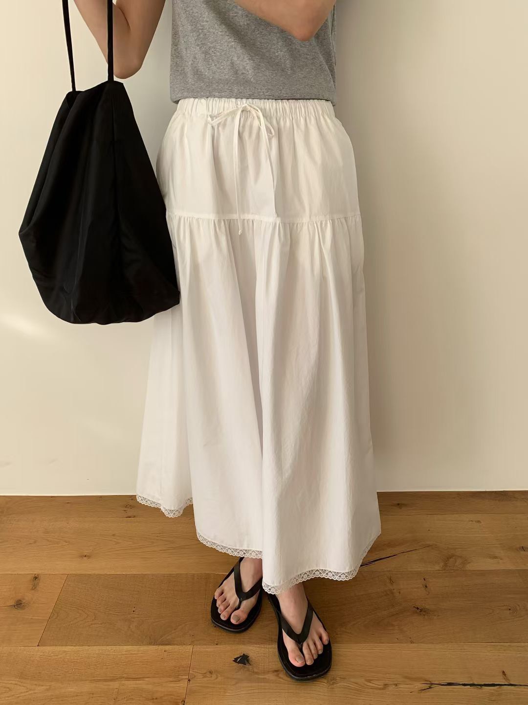 B61.甜美下襬蕾絲滾邊傘裙